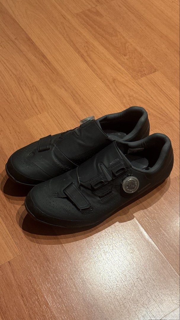Shimano XC5/XC501M (Category: Bicycles) located in Makati City. Submitted by raphcamero (Listing ID 1470459566, Image 1). Description: Shimano XC5 Mountain Bike Shoes - Color: Black - Size: EU 41 / US 7.6 / 25.8 cm - Closure: BOA dial system with velcro forefoot strap - Soles: Michelin rubber outsoles with cleats included - Condition: Normal signs of wear on soles and uppers from road use; clean insoles RFS: quit cycling Not open for trade*.