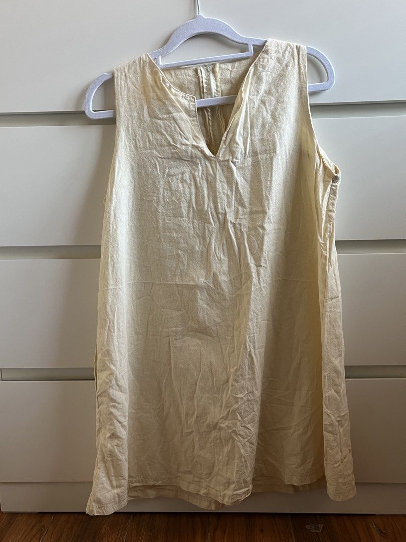 Short Dress (Category: Dresses) located in Taytay. Submitted by prelovedbyblaire (Listing ID 1470392194, Image 1). Description: - Cream sleeveless mini dress - Lightweight, breathable fabric - Simple V-neckline - Straight, loose fit - Mid-thigh length - Easy slip-on style for warm weather.