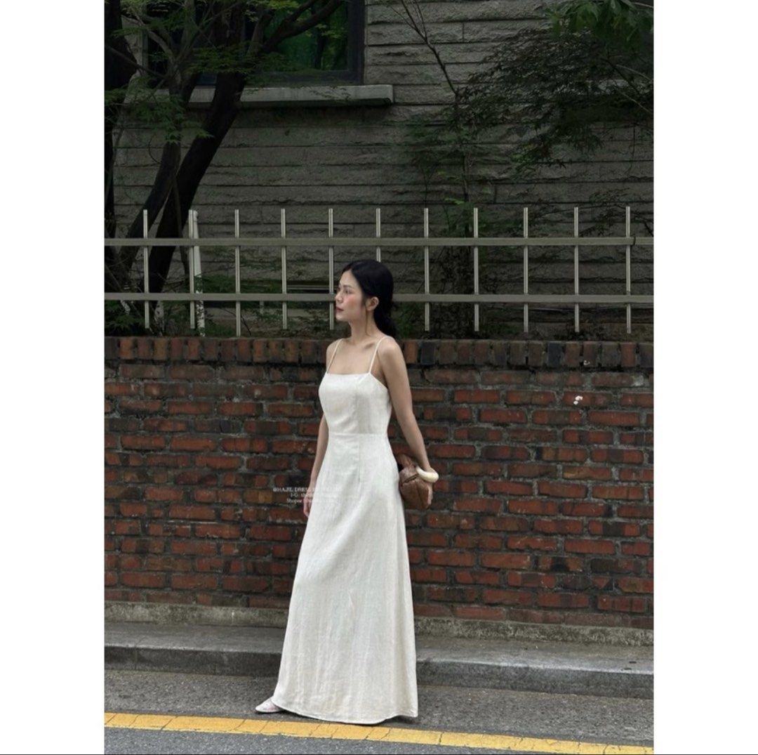 Shu Shi Linen Dress (Category: Dresses) located in Makati City. Submitted by prelovedclothes.m (Listing ID 1470467736, Image 1). Description: - Color: Neutral cream - Material: Classic lightweight linen texture - Design: Spaghetti straps, square neckline, and fitted bodice - Fit: Flowy long skirt reaching ankle length.