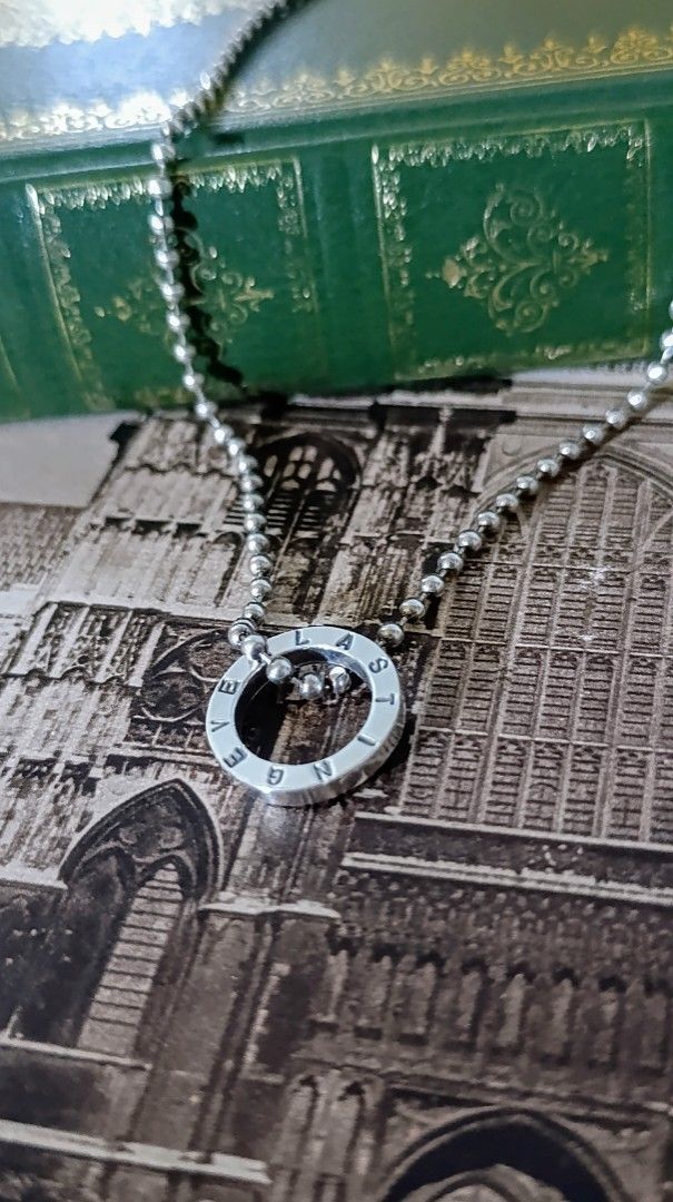 Silver Ring Pendant Necklace With Ball Chain (Category: Necklaces) located in Gingoog City. Submitted by ThePurpleBox (Listing ID 1470430631, Image 1). Description: Channel timeless, romantic elegance! 1580php✅ This minimalist flat-ring design beautifully mirrors the sentimentality of the Victorian Era, when jewelry was deeply symbolic. The "EVERLASTING" engraving echoes the classic Victorian "Acrostic" and "Mizpah" jewelry traditions—where hidde