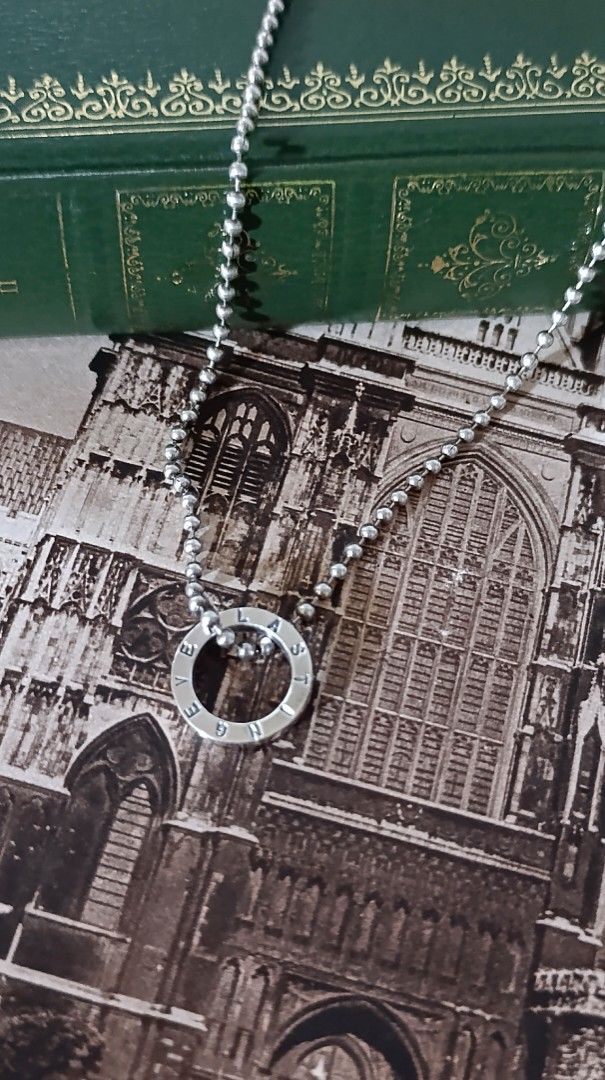 Silver Ring Pendant Necklace With Ball Chain (Category: Necklaces) located in Gingoog City. Submitted by ThePurpleBox (Listing ID 1470430631, Image 2). Description: Channel timeless, romantic elegance! 1580php✅ This minimalist flat-ring design beautifully mirrors the sentimentality of the Victorian Era, when jewelry was deeply symbolic. The "EVERLASTING" engraving echoes the classic Victorian "Acrostic" and "Mizpah" jewelry traditions—where hidde