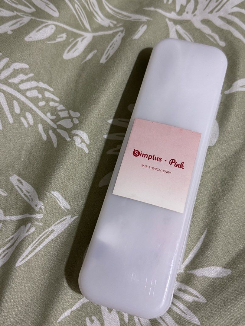Simplus Pink Mini Hair Straightener (Category: Hair) located in Manila. Submitted by nmiamaya (Listing ID 1470515564, Image 1). Description: - 2-in-1 design: Functions as both a hair straightener and a curler - Ultra-compact: Only 17cm, perfect for travel and quick touch-ups on the go - Clean white colorway with pink accent button - Complete set: Includes original protective plastic storage case with integrated power cord RFS: Never been use, nak