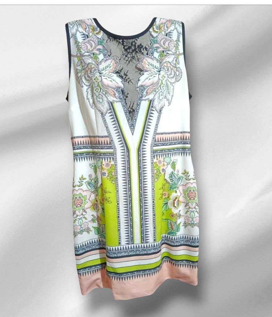 Roberto Cavalli Sleeveless Printed Pattern Dress with Black Back Panel (Category: Dresses) located in Paranaque City. Submitted by calm_youngstore7 (Listing ID 1470444042, Image 2). Description: - Style: Sleeveless dress with a vibrant multi-color floral and geometric front print - Details: Elegant sheer black lace panel at the upper chest - Back: Solid black fabric with a secure back zipper closure - Measurements: 18 inches across the chest, 32 