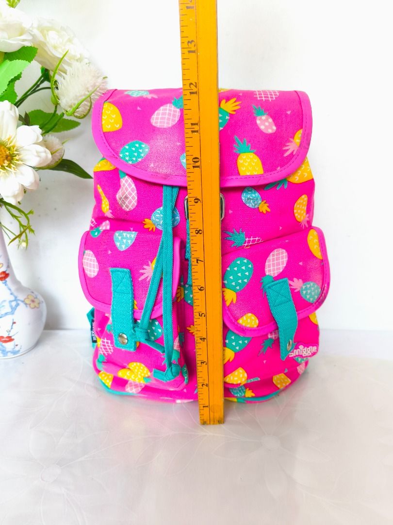 Smiggle Pineapple Canvas Backpack (Hot Pink & Teal) (Category: Backpacks) located in Valenzuela. Submitted by sakura_japan_surplus (Listing ID 1470406243, Image 3). Description: Smiggle Pineapple Canvas Backpack (Hot Pink & Teal) Price: ₱650 Condition: Excellent Preloved (Cleaned, sanitized, and ready to use) Description Brighten up your little one's day with this super cute and vibrant Smiggle Canvas Mini Backpack! Featuring an adorable all-over