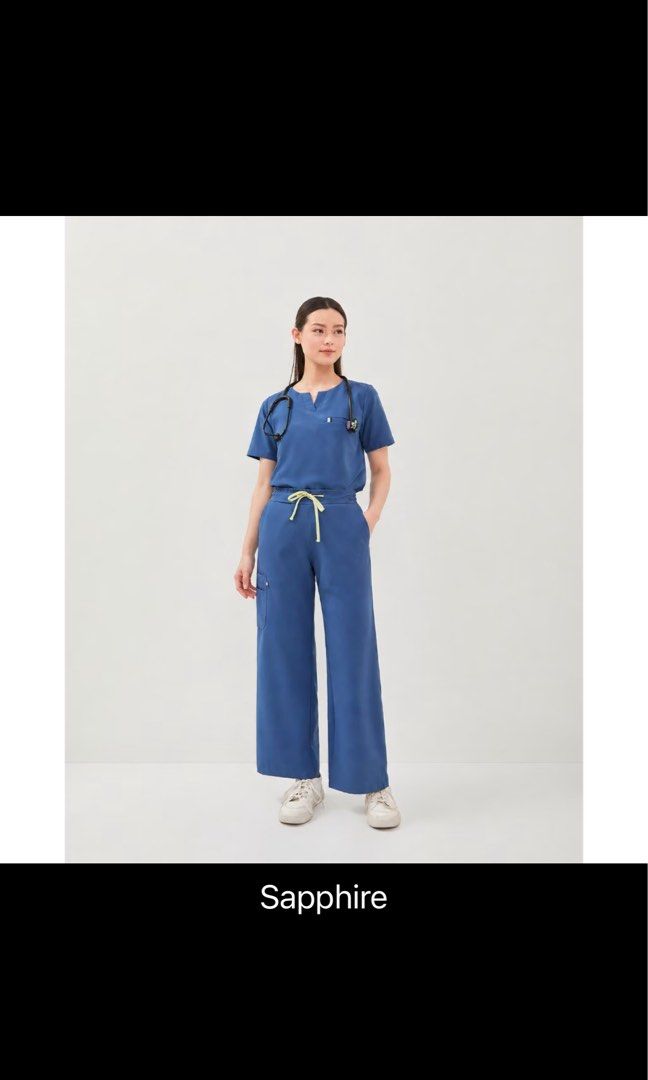 Snug scrubs - Sapphire (Category: Sets or Coordinates) located in Quezon City. Submitted by jas.xxna (Listing ID 1470508234, Image 1). Description: - Color: Sapphire Blue - Set includes: V-neck top with pocket and matching wide-leg trousers - Features: Contrasting drawstring waist for a secure and comfortable fit, - Ideal for: Long hospital shifts, clinic wear, and a clean professional look Only tried, doesn’t fit hence selling.
