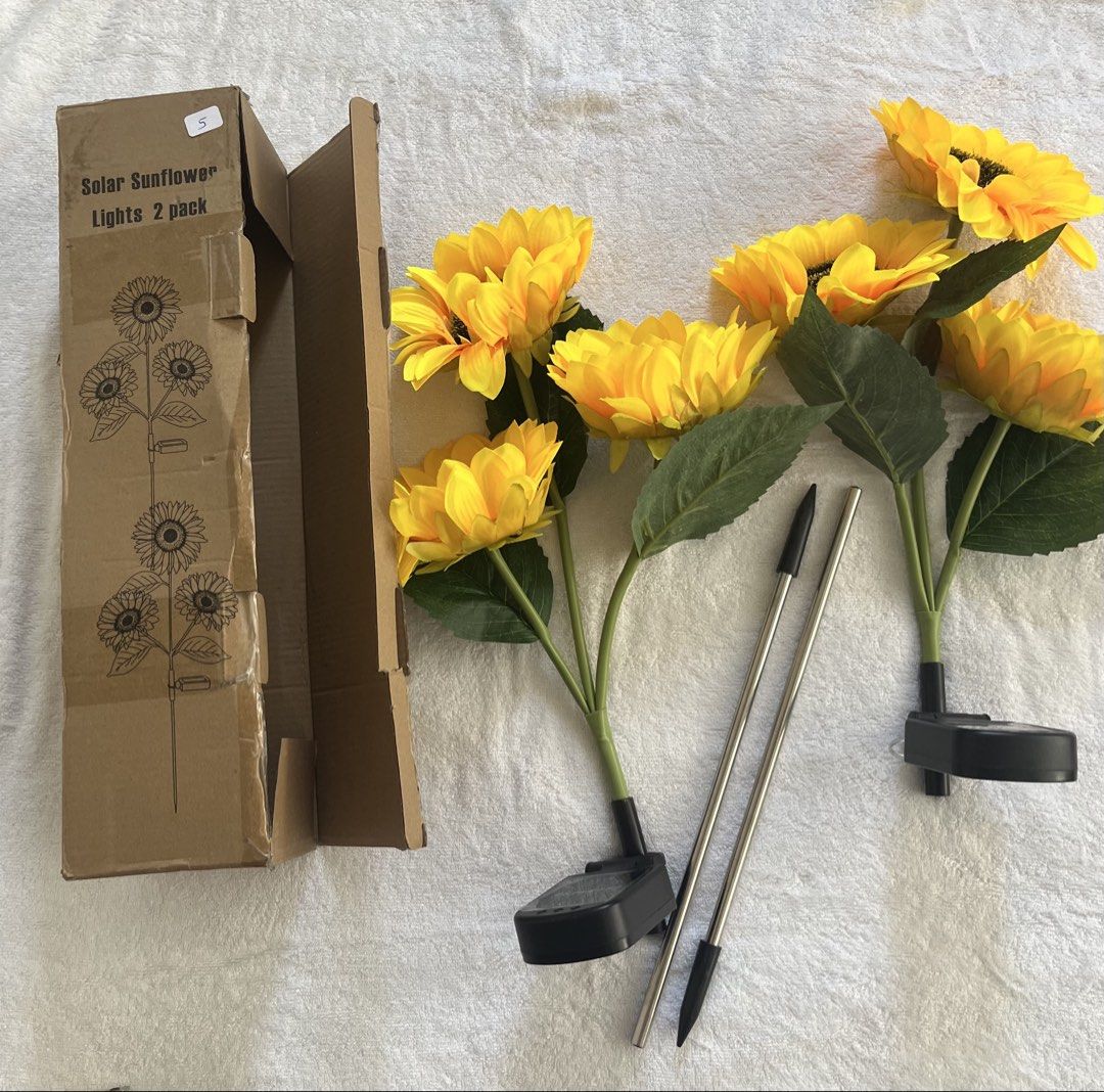 Solar Sunflower Garden Decor (Category: Gardening Tools & Ornaments) located in Marikina City. Submitted by crewstuff (Listing ID 1470353902, Image 1). Description: 2 solar sunflower in a box for ₱1500. Measurement 28 inches tall..