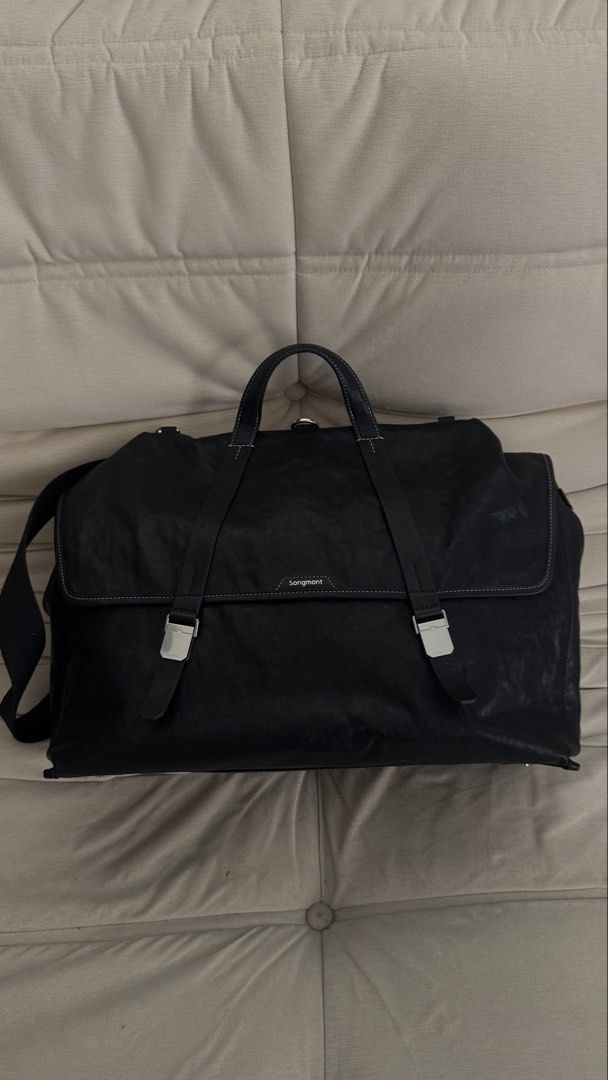 Songmont Large Shan Briefcase (Category: Shoulder Bags) located in Quezon City. Submitted by shopwitheika (Listing ID 1470385266, Image 2). Description: Complete set -box -dust bag -paper bag -card Unused Vegetable-tanned leather gains unique patina with time. 4 distinct carry options—crossbody, shoulder, handheld, backpack multiple compartments and an adaptable strap. Weight (Shoulder Strap Not Included): 945g/2.08lbs Dimension: L 40cm/15.75” * 