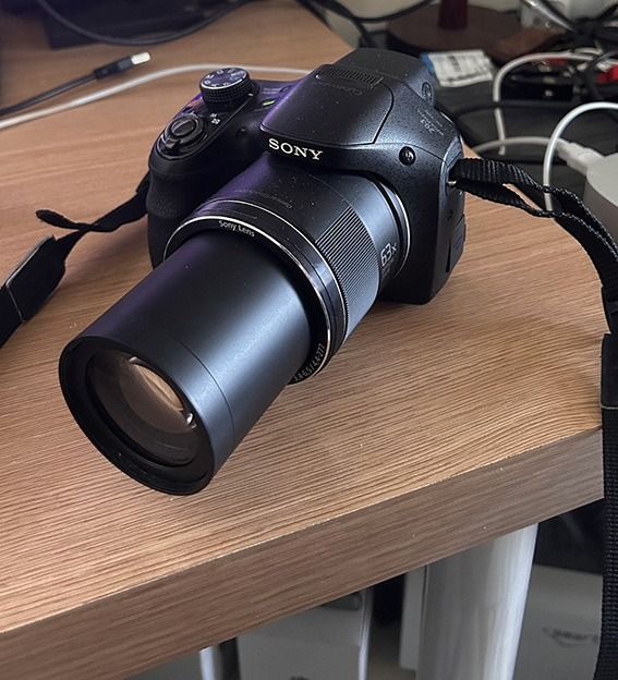 Sony Cyber-shot DSC-H400 (Category: Cameras) located in Pasig City. Submitted by kosander (Listing ID 1470357395, Image 1). Description: Sony Cyber-shot DSC-H400 with 63 x zoom is a DSLR-like bridge digital camera built around an ultra-long zoom lens. • Sensor: 20.1-megapixel 1/2.3-inch Super HAD CCD • Lens: 63x optical zoom (24.5–1550mm 35mm equivalent), F3.4–6.5 aperture • Image Stabilization: Optical SteadyShot • Screen & Viewfinder: 3.0-inch 