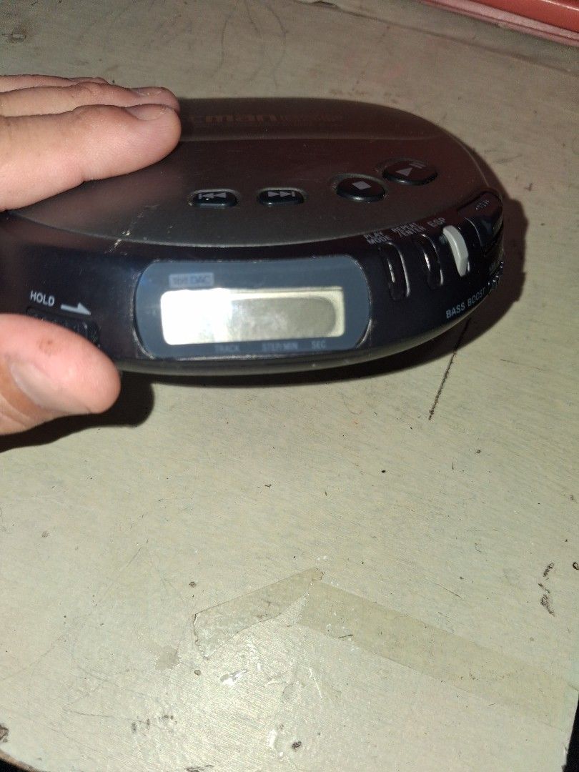 Sony Discman ESP D-247 Portable CD Player (Category: Portable Music Players) located in Manila. Submitted by marcas022798212 (Listing ID 1470351567, Image 3). Description: - Vintage Sony Discman D-247 (Grey & Black) - Refurbished unit with original bottom sticker - Mega Bass & Electronic Shock Protection (ESP) - Powered by 2 AA batteries - Tested and working, shows normal scuffs from age.