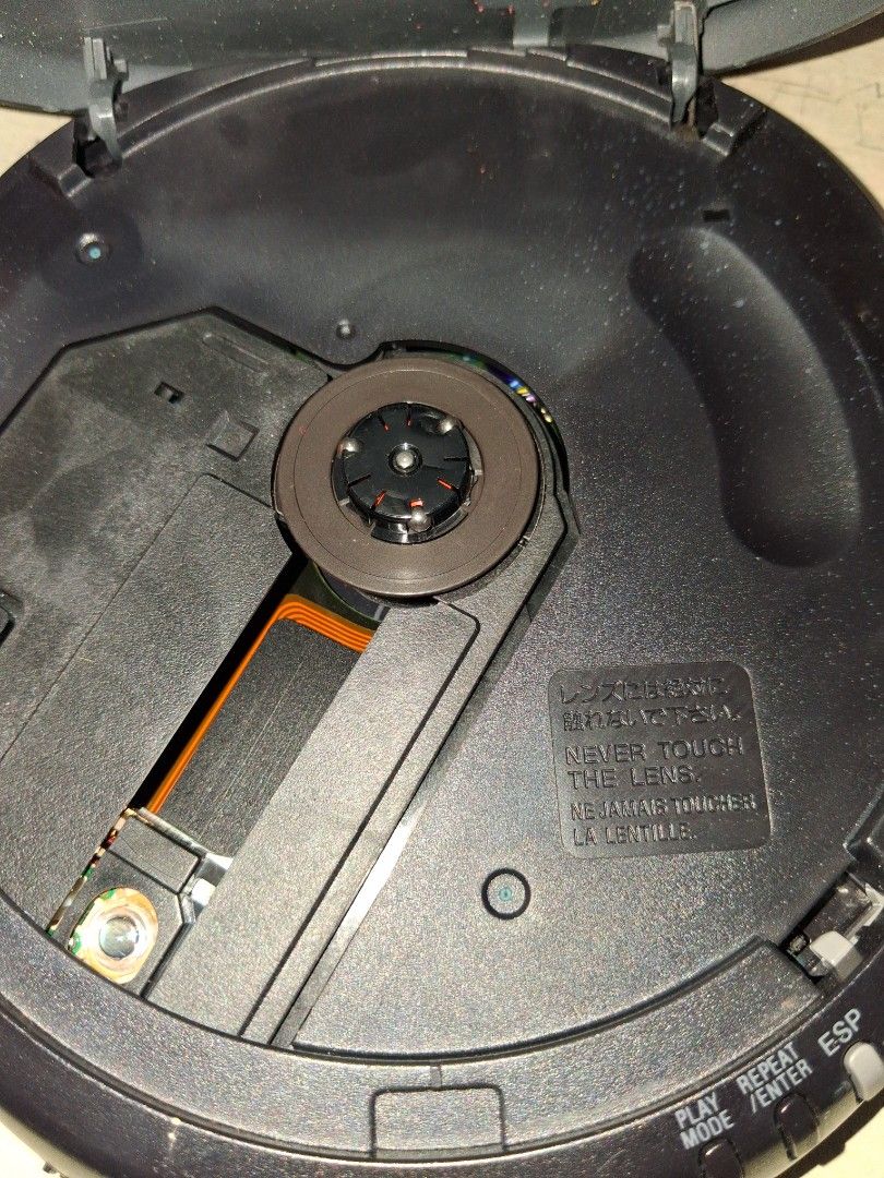 Sony Discman ESP D-247 Portable CD Player (Category: Portable Music Players) located in Manila. Submitted by marcas022798212 (Listing ID 1470351567, Image 2). Description: - Vintage Sony Discman D-247 (Grey & Black) - Refurbished unit with original bottom sticker - Mega Bass & Electronic Shock Protection (ESP) - Powered by 2 AA batteries - Tested and working, shows normal scuffs from age.