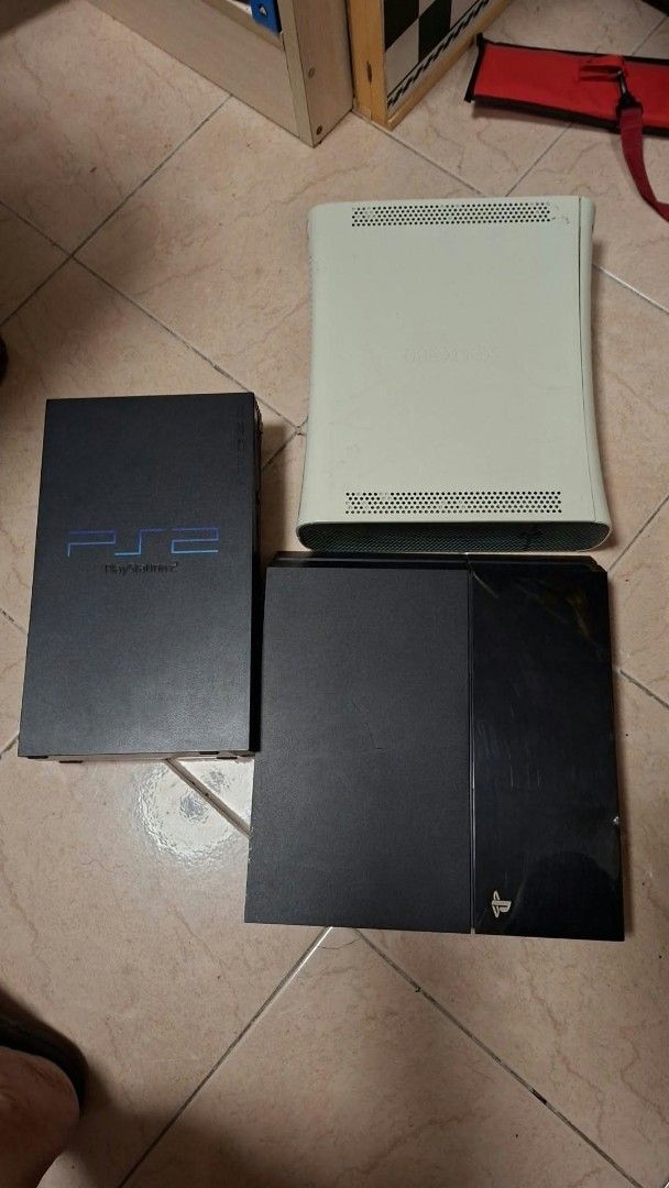 Sony PlayStation and Microsoft Xbox 360 Consoles Bundle (Category: PlayStation) located in Antipolo. Submitted by cheche2111 (Listing ID 1470464026, Image 1). Description: - Bundle includes: Original PlayStation 2, PlayStation 4, and Xbox 360 consoles - Condition: Normal surface wear from regular gaming sessions - Selling as a complete set (all items included as pictured) - Great opportunity to pick up multiple classic systems at once * ps2 and p