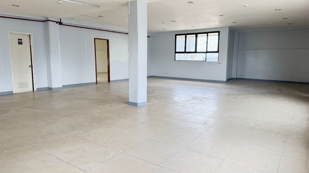 Spacious commercial office space for rent (Category: Office Furniture & Fixtures) located in Valenzuela. Submitted by jcfernandez717.1 (Listing ID 1470400056, Image 2). Description: - Spacious open floor plan ideal for various commercial uses - with modern recessed lighting, fire sprinklers and fire alarms system - Multiple private rooms and offices with wooden doors - Clean tiled flooring throughout the main area - Neutral grey walls and abundan