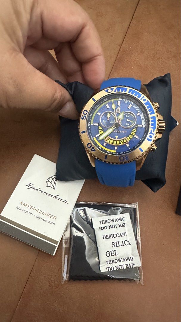 Spinnaker Chronograph Watch Blue Gold (Category: Men's Watches) located in Bacoor. Submitted by brightgem_ff11f7 (Listing ID 1470385343, Image 2). Description: - Brand new, unworn Spinnaker chronograph watch with protective materials still attached - Stunning blue dial housed in a stylish gold-tone case - Sporty blue rubber strap with eye-catching yellow and white bezel and hand accents - Includes original branded presentation box, tag, and unope