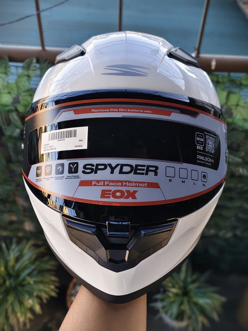 Spyder EOX Full Face Helmet White Size XL (Category: Bicycles) located in Manila. Submitted by kuys_vince. (Listing ID 1470554882, Image 1). Description: Spyder EOX full face motorcycle helmet. Gloss white finish with grey and red graphics. Size XL, fits 61 to 62 centimeters. ECE 22.06 safety certified. Pinlock 70 ready visor with protective sticker still attached. Quick release retention system, multi-density EPS liner, and ABS composite shell. 