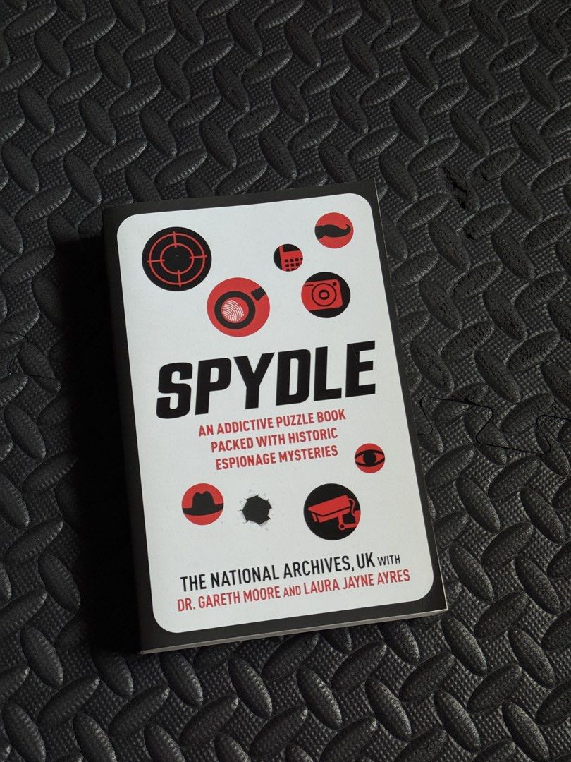 Spydle Puzzle Book by Dr. Gareth Moore (Category: Storybooks) located in Quezon City. Submitted by cheekbuns (Listing ID 1470365250, Image 1). Description: - Only answered first few puzzles - Bought from Fully Booked .
