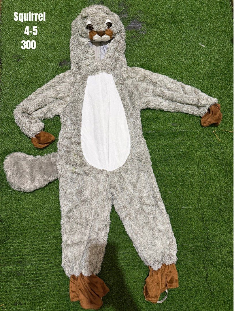 Squirrel Animal Onesie Costume (Category: Babies & Kids Fashion) located in San Fernando. Submitted by InvisibleMe (Listing ID 1470452632, Image 1). Description: - Adorable gray squirrel onesie with contrasting white belly panel - Complete with attached animal-face hood, brown paws, and a large bushy tail - Convenient front zipper closure for quick and easy dressing - Size: Fits kids 4 to 5 years old - Versatile use: Great for costume parties, dr