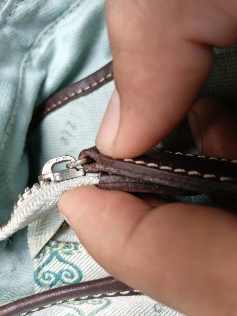SSAMZIE Light Blue Monogram (Category: Shoulder Bags) located in Cagayan de Oro. Submitted by warmbird-f84aab (Listing ID 1470552254, Image 3). Description: Cute & practical vintage-style handbag from Korean brand SSAMZIE! Light blue fabric with signature monogram pattern + smooth brown faux leather trims. Spacious interior with multiple pockets, zip closure, and silver hardware. Lightly used with normal signs of wear — still in great condition! 