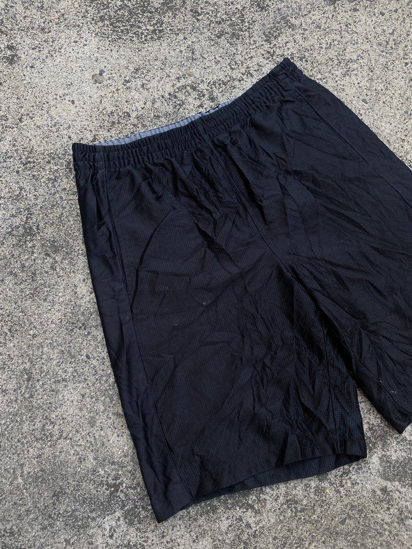 Starter Black Athletic Basketball Shorts (Category: Shorts) located in Alcala. Submitted by georgetorr31608 (Listing ID 1470510065, Image 2). Description: Starter black mesh athletic shorts with side panel details. Elastic waistband featuring a grey drawstring. Small Starter logo embroidered near the bottom left hem. Great breathable material for workouts or casual wear. Easy pull-on style..