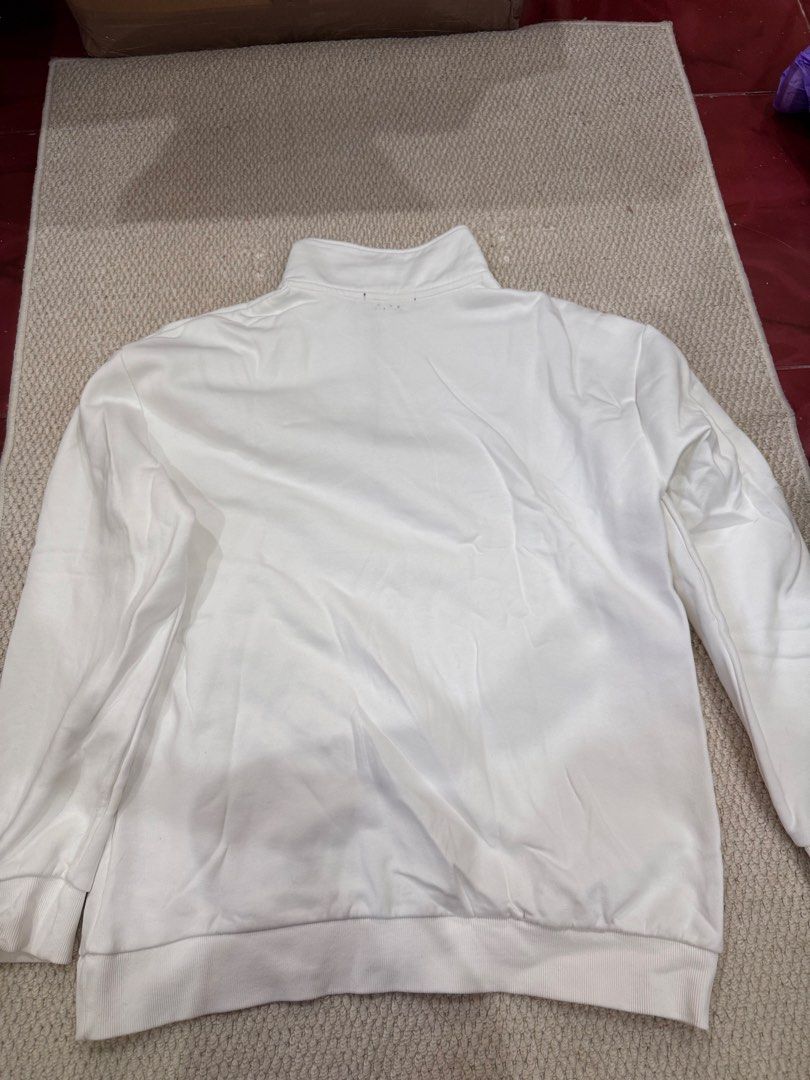 Stock 157 Quarter-Zip Sweatshirt White (Category: Coats, Jackets and Outerwear) located in Valenzuela. Submitted by crabncorn (Listing ID 1470352937, Image 3). Description: - Item: White quarter-zip sweatshirt - Size: M - Material: Solid fleece with ribbed cuffs and hem - Details: Stand-up collar with silver-tone metal zipper - Flaw: Faint brownish stains near the center front chest and collar (please manage expectations) - Stock: 157 available.