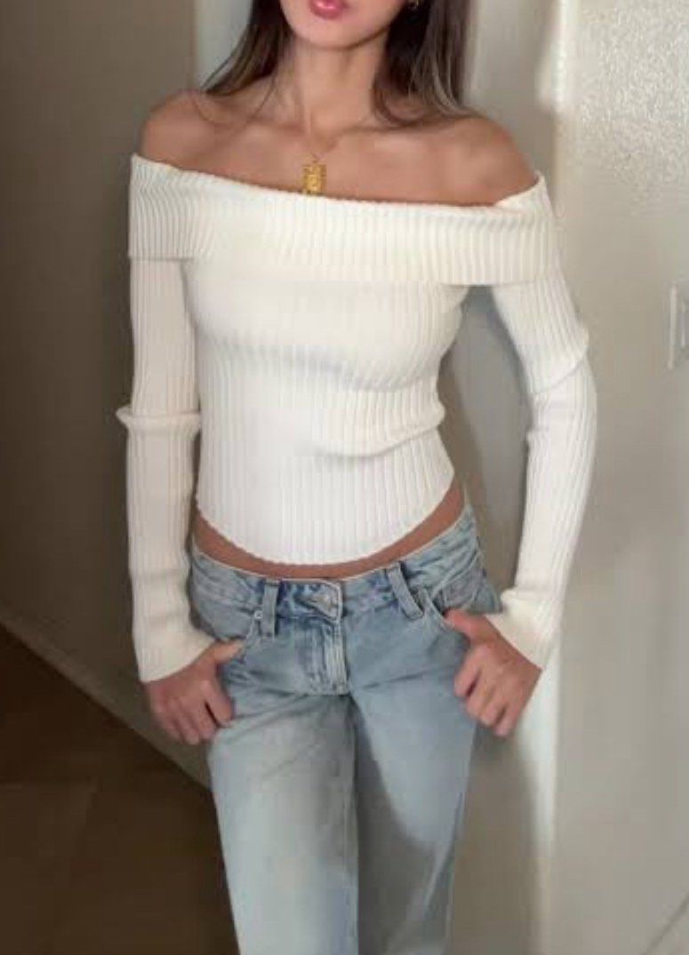 Stradivarius White Knitted Off-the-shoulder (Category: Coats, Jackets and Outerwear) located in Manila. Submitted by rearrangemyworld_ (Listing ID 1470384848, Image 1). Description: Like new, only used this once for christmas party - Fits xs-m frame - Very stretchy and comfy - Can be styled with so many bottoms (like pants, skirts, etc) - Good textile - Got this for around 1.5k+ in Stradivarius Megamall.