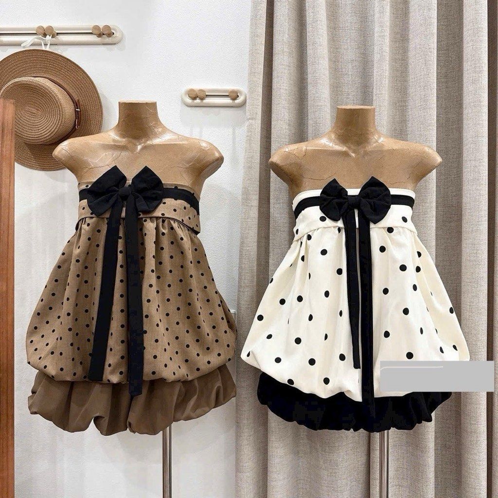 Strapless Polka Dot Bubble Dress with Bow (Category: Dresses) located in Cebu City. Submitted by joybero (Listing ID 1470554590, Image 1). Description: - Style: Strapless coordinate with a puffy bubble hem and layered contrast trim - Design: All-over polka dot print featuring a large chest bow with long hanging ties - Colors Available: Brown with white dots. -Best Fit: Small-Semi med - Condition: Brand new, never worn - Perfect for: Parties, date