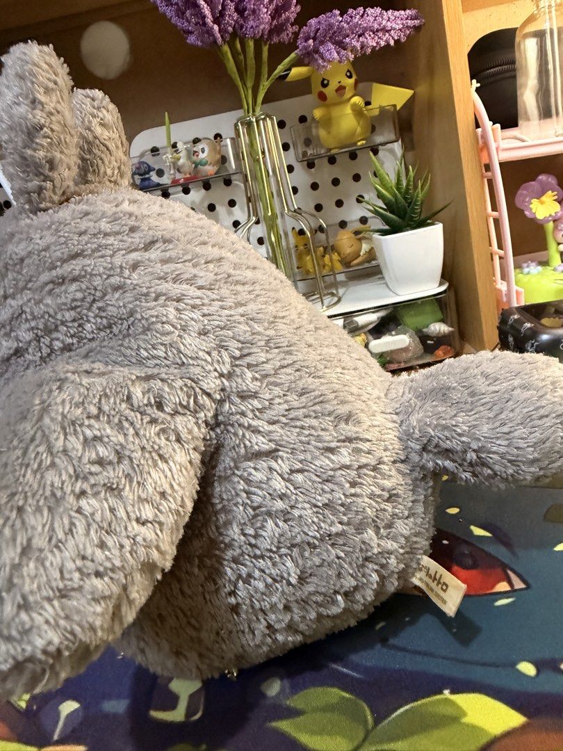 Studio Ghibli Totoro Plush Stuffed Toy Grey (Category: Plushies & Soft Toys) located in Baguio. Submitted by jonathanseller_buyer (Listing ID 1470514313, Image 3). Description: - Authentic Studio Ghibli Grey Totoro plushie - Super soft, fuzzy material with a cute white belly and round ears - Features a chunky tail on the back and small side tag - Pristine condition: clean fur, no stains, rips, or damage - Perfect addition to any Ghibli collection