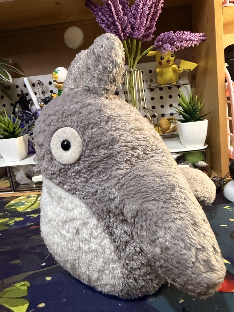 Studio Ghibli Totoro Plush Stuffed Toy Grey (Category: Plushies & Soft Toys) located in Baguio. Submitted by jonathanseller_buyer (Listing ID 1470514313, Image 2). Description: - Authentic Studio Ghibli Grey Totoro plushie - Super soft, fuzzy material with a cute white belly and round ears - Features a chunky tail on the back and small side tag - Pristine condition: clean fur, no stains, rips, or damage - Perfect addition to any Ghibli collection