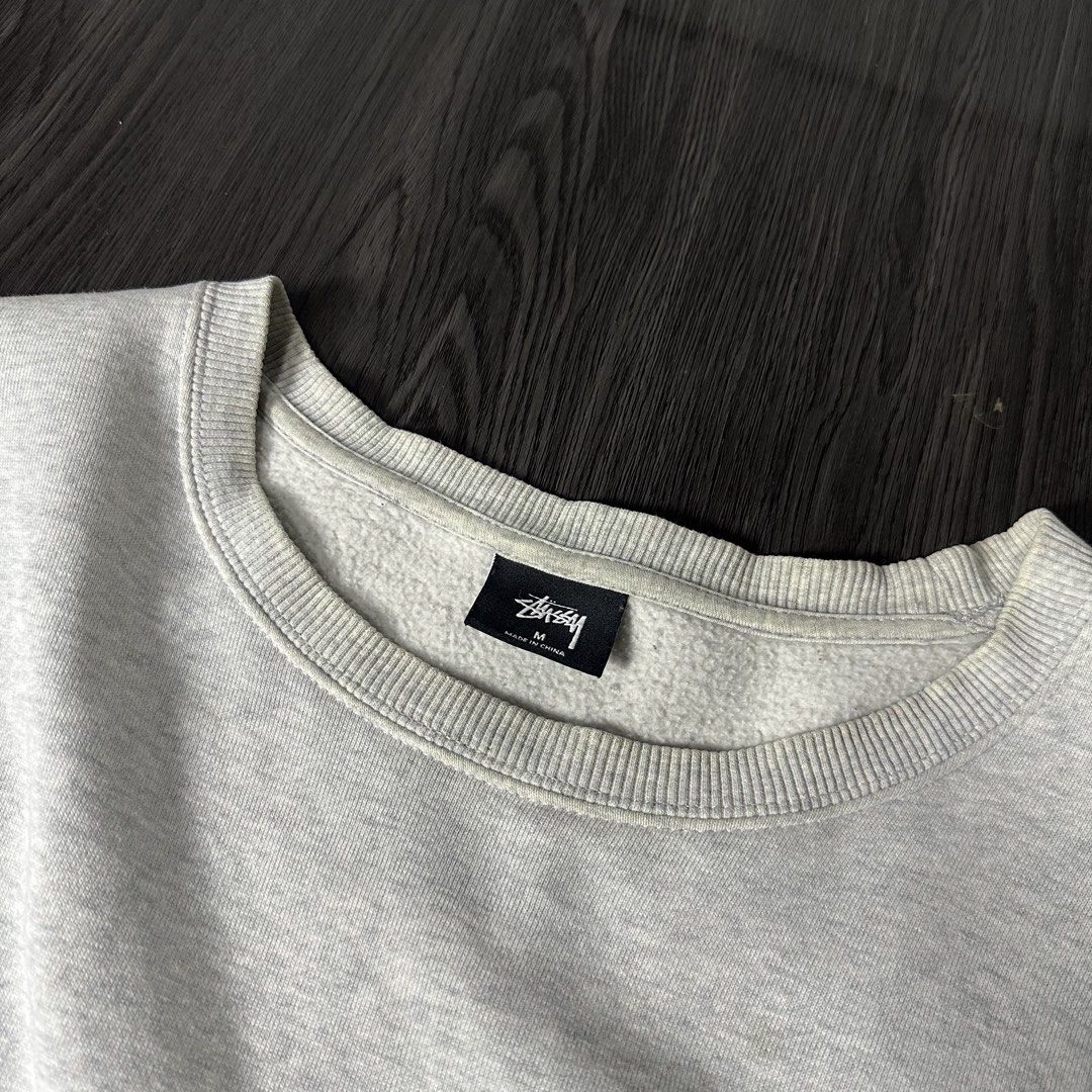 STUSSY (Category: Formal Shirts) located in San Jose del Monte. Submitted by xanthrift2.0 (Listing ID 1470457083, Image 3). Description: STUSSY INTERNATIONAL GREY SWEATER color rate: 9.7/10 dimes: 22 x 27 (medium) ₱999 .