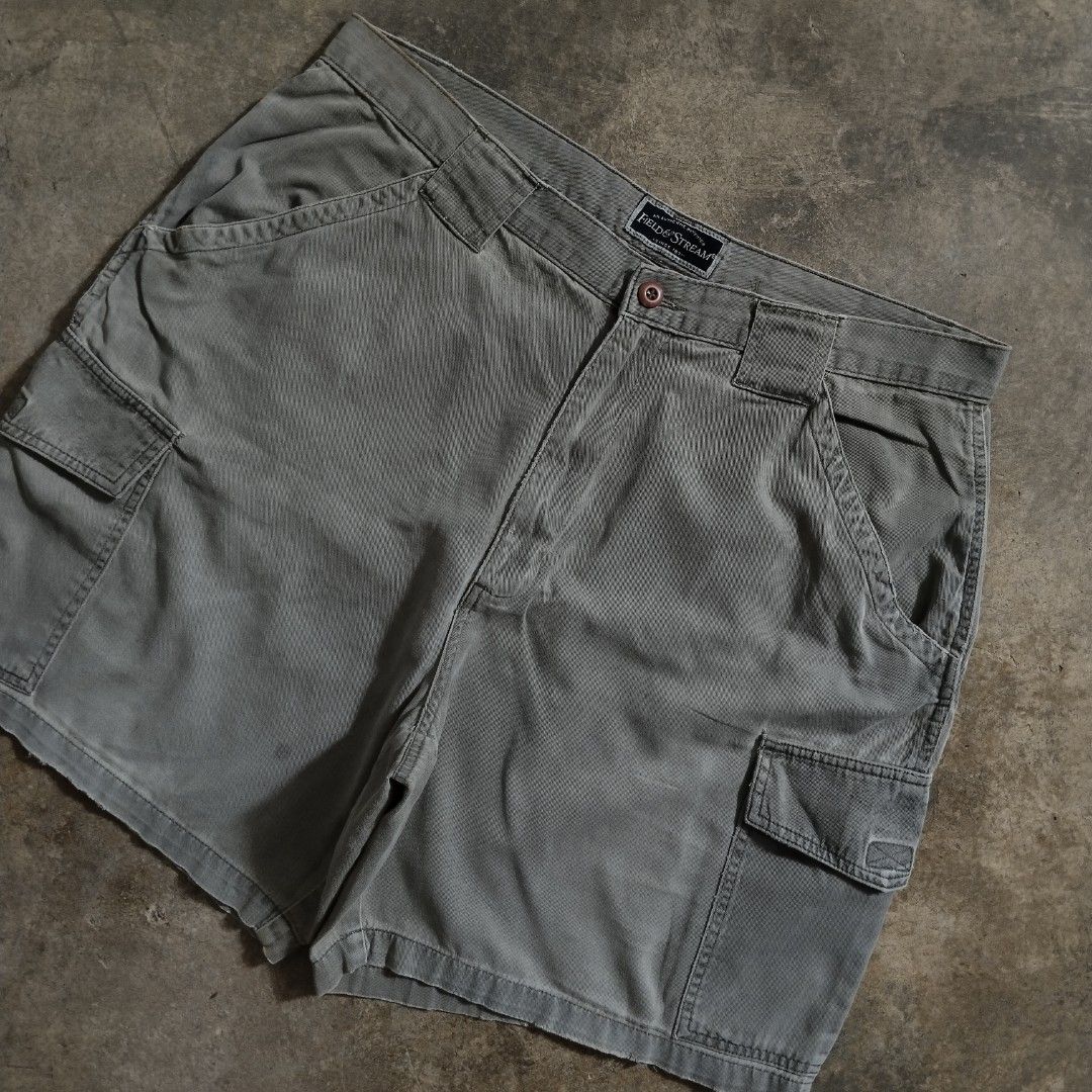 sunfaded field & stream olive green cargo shorts (Category: Shorts) located in Bulacan. Submitted by hustleoverluckphv2 (Listing ID 1470495534, Image 3). Description: sunfaded field & stream olive green cargo shorts 38 on tag Measurements Waist - 37" Length - 21" Hem - 13" Issue: pinholes & discoloration Claim - 299.