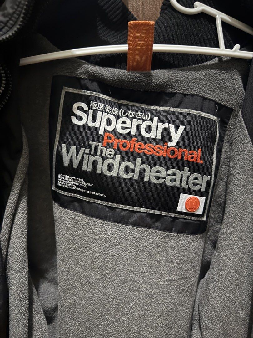 SUPERDRY Jacket for cold weather (Category: Coats, Jackets and Outerwear) located in Manila. Submitted by fastforest.ac2d10 (Listing ID 1470495264, Image 2). Description: Bought from Japan 2017 Original 3 Zipper Decent Condition White lettering on zipper has stain (seen in picture) .
