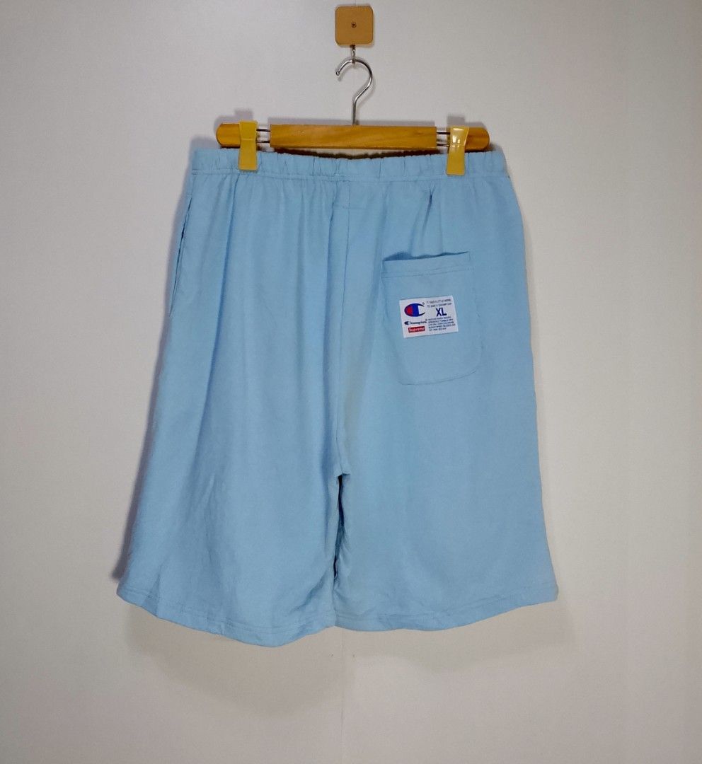 Supreme Champion Light Blue Shorts XL (Category: Shorts) located in Manila. Submitted by moisky18 (Listing ID 1470522566, Image 2). Description: - Authentic Supreme x Champion Collaboration - Color: Light Blue - Size: XL with comfortable elastic waistband - Large Champion script logo printed on the lower left leg - Small embroidered Champion 'C' logo near the top left waist - Convenient single back pocket with co-branded woven label - Perfect for