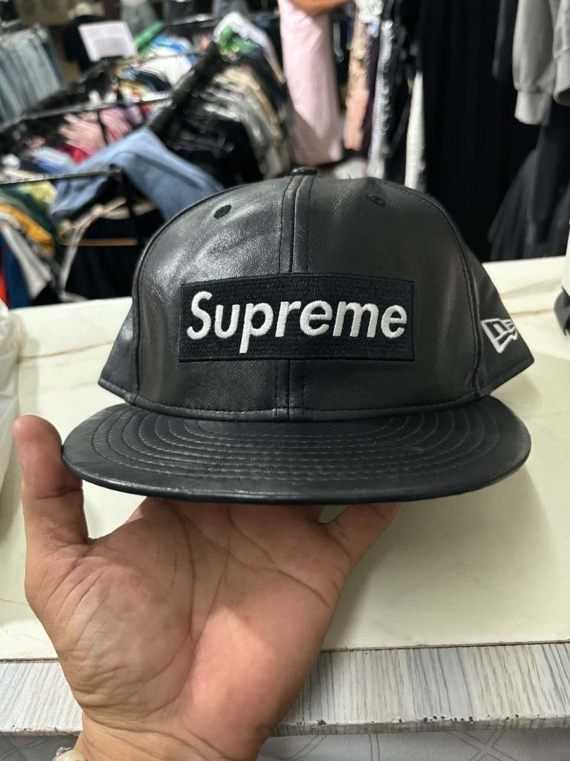Supreme x new era leather fitted cap (Category: Caps & Hats) located in Don Carlos. Submitted by jayhads (Listing ID 1470458445, Image 1). Description: 7 1/8 size all details and tags are in the pictures may kunting scratch sa top button.
