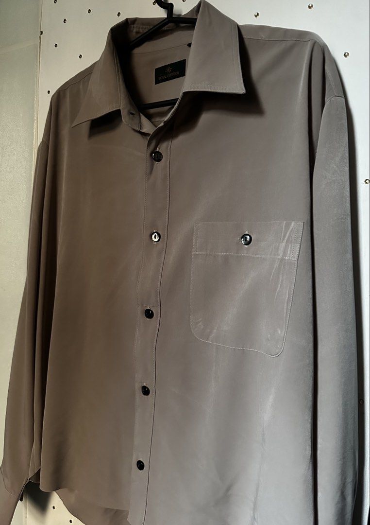 Taupe button down longsleeves (Category: Longsleeves) located in Cavite. Submitted by chicfinds.slay (Listing ID 1470453388, Image 2). Description: ✨soft texture very elegant/velvet ✨perfect fit corporate /office/casual ✨best fit s-semi large ✨need quick iron lang ✨no flaws.