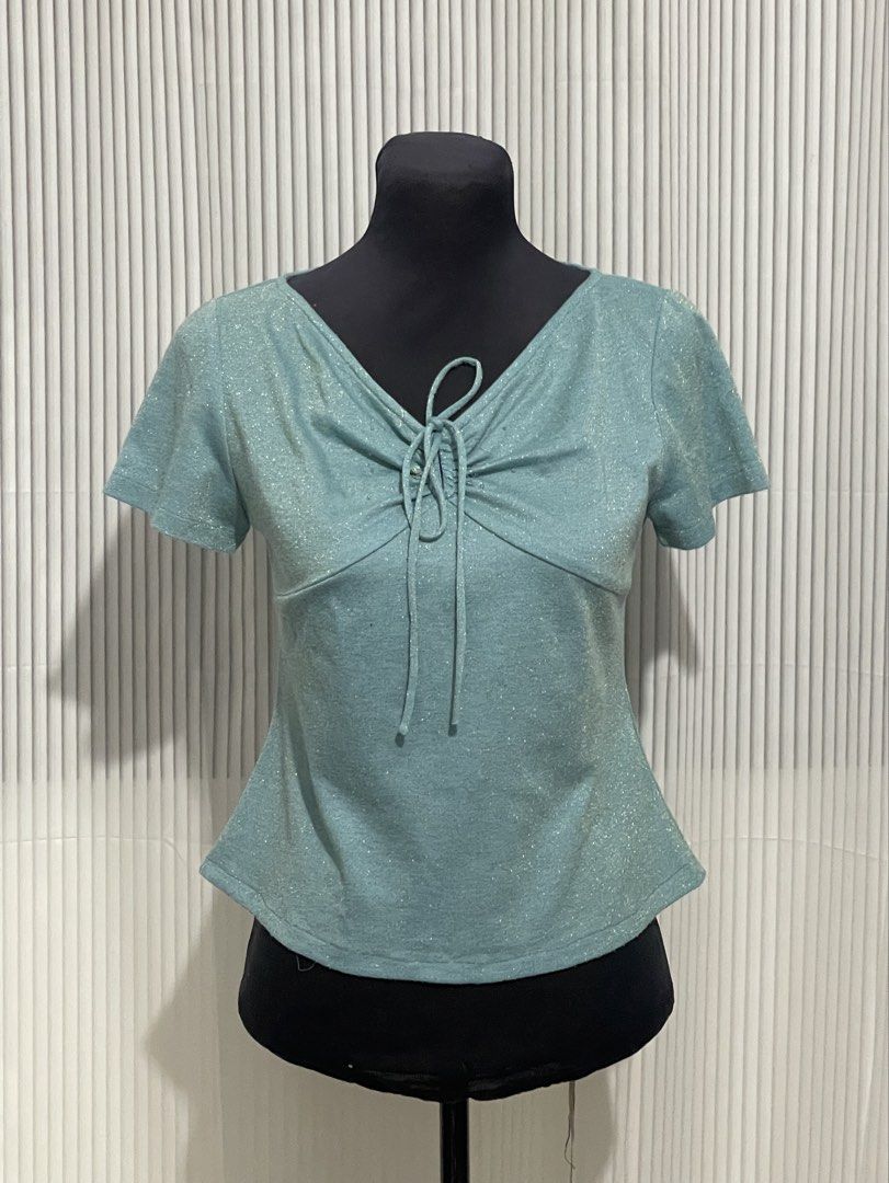 Teal Beaded & Glittered Top (Category: Blouses) located in Tuguegarao City. Submitted by ziggerryy (Listing ID 1470525541, Image 1). Description: Cute🩵 No flaws. No holes Fits XS-S.