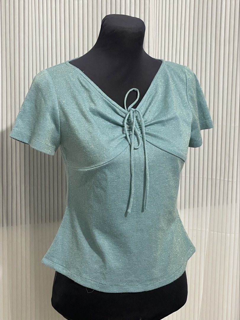 Teal Beaded & Glittered Top (Category: Blouses) located in Tuguegarao City. Submitted by ziggerryy (Listing ID 1470525541, Image 2). Description: Cute🩵 No flaws. No holes Fits XS-S.