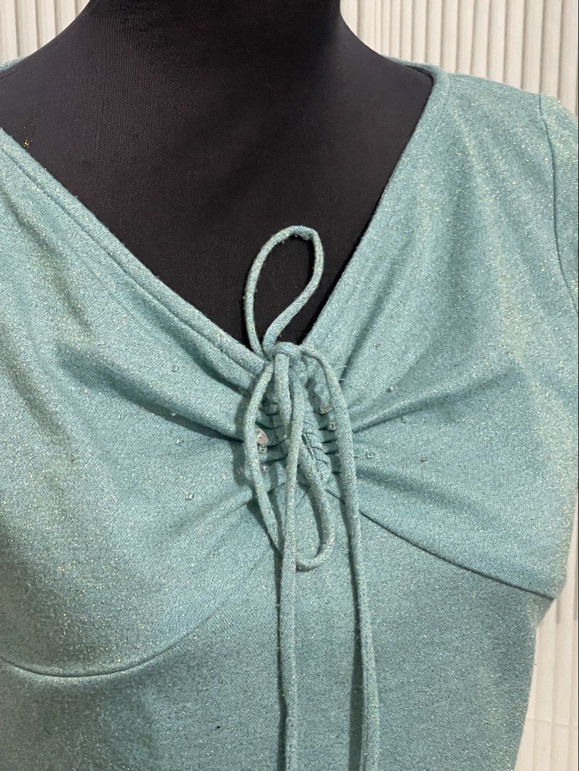 Teal Beaded & Glittered Top (Category: Blouses) located in Tuguegarao City. Submitted by ziggerryy (Listing ID 1470525541, Image 3). Description: Cute🩵 No flaws. No holes Fits XS-S.
