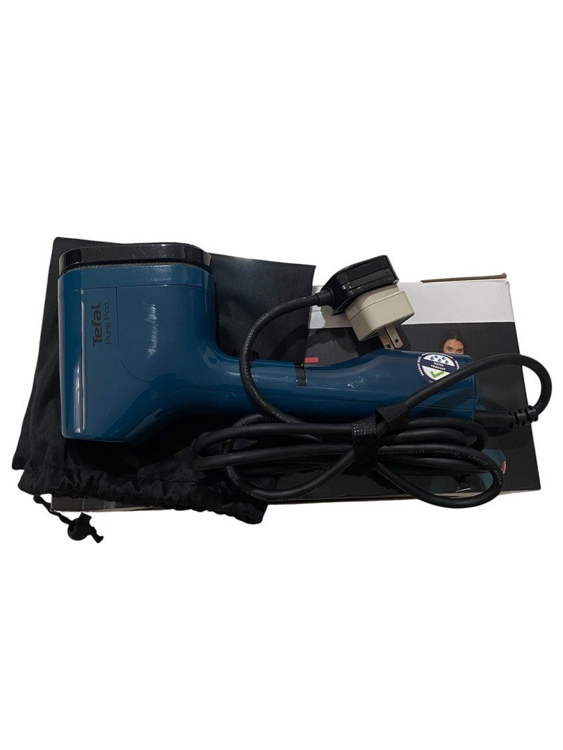 Tefal Pure Pop Handheld Garment Steamer Blue (Category: Irons & Steamers) located in Manila. Submitted by saintjohnn (Listing ID 1470387634, Image 1). Description: - Item: Tefal Pure Pop Handheld Garment Steamer - Color: Dark Blue - Condition: Fully functional and ready to use - Perfect for: Quick touch-ups and travel (super easy to pack) - Inclusions: Original box, storage pouch, and power cord with adapter - Reason for selling: Decluttering - M