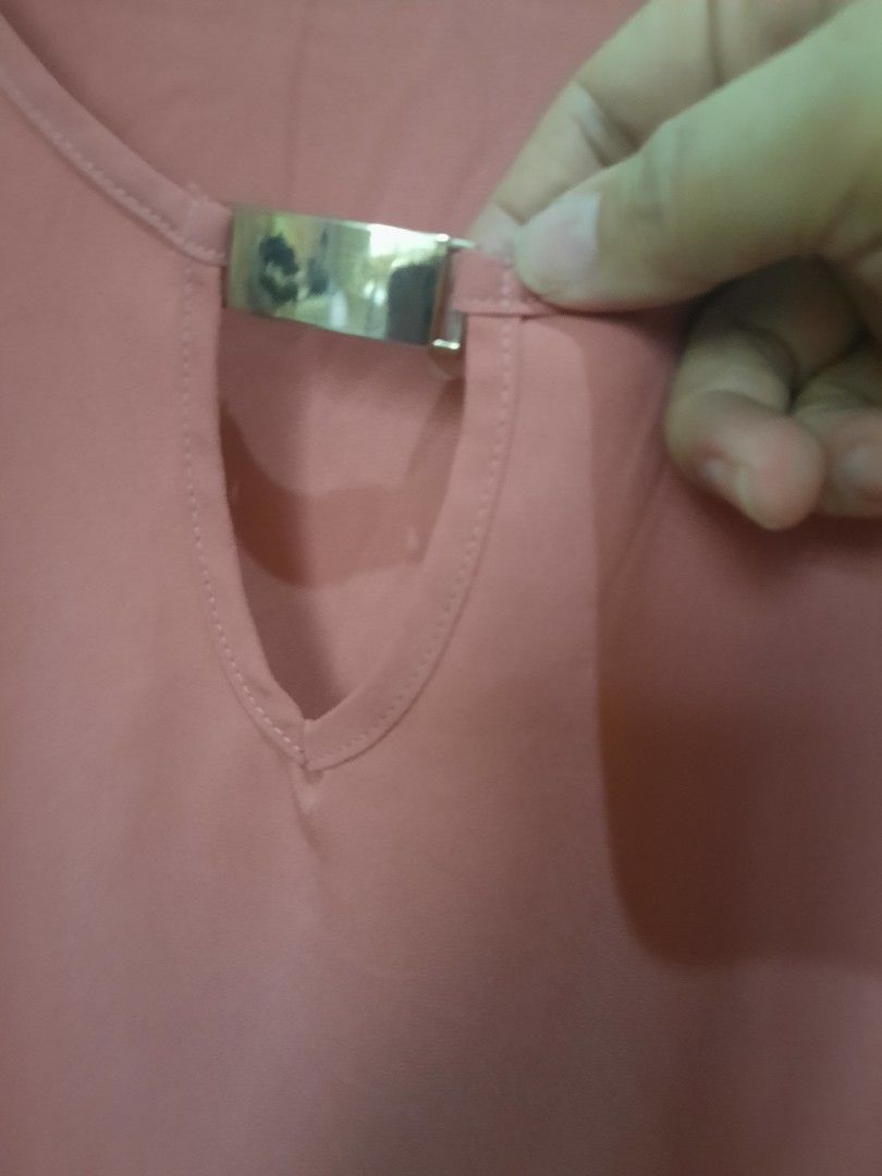 Terracotta Keyhole Chiffon Blouse (Category: Longsleeves) located in Quezon City. Submitted by dannikkishoppe2 (Listing ID 1470554206, Image 3). Description: Terracotta Keyhole Chiffon Blouse‼️₱200‼️ • Style & Fit: Elegant, relaxed-fit chiffon blouse featuring a scoop neckline with a stylish keyhole cutout and 3/4 roll-tab sleeves. • Material & Texture: Lightweight, breathable chiffon fabric with a soft, fluid drape for all-day comfort. Please ma