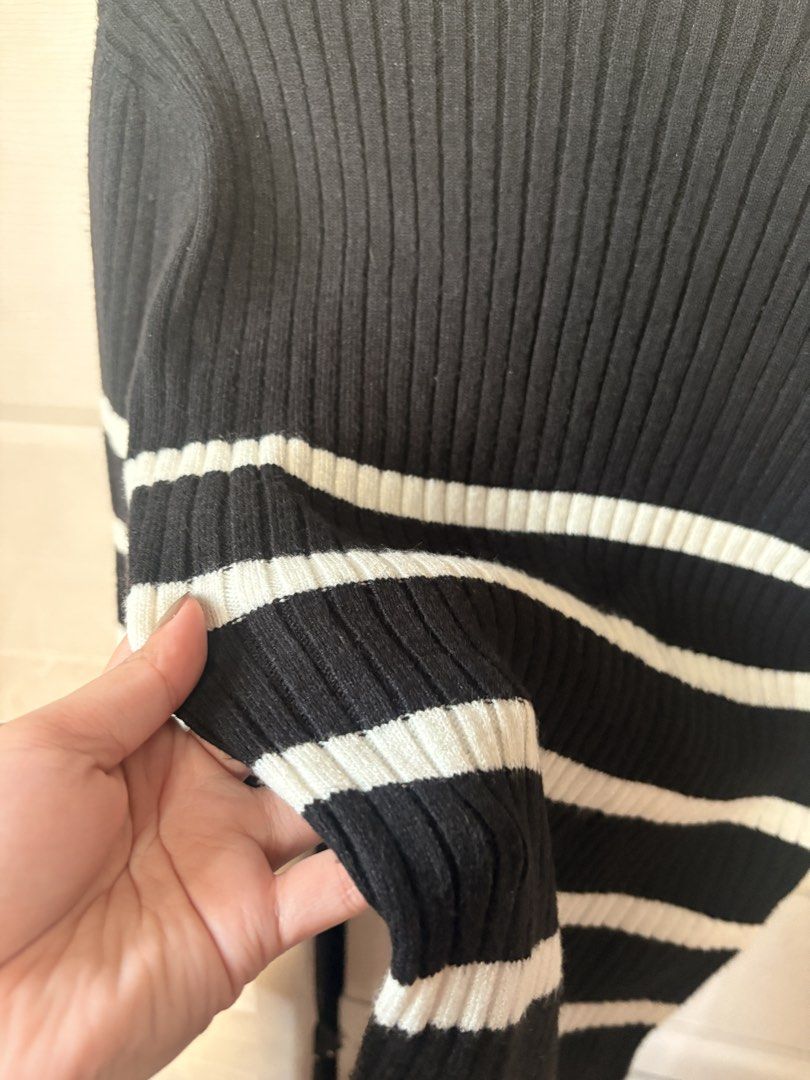 Terranova Ribbed Sweater (Category: Dresses) located in Makati City. Submitted by iu__00 (Listing ID 1470444627, Image 3). Description: - Brand: Terranova - Item: Striped ribbed sweater dress - Color: Classic black and white stripes - Size: Medium - Details: Mock neck collar, long sleeves, heavy warm ribbed knit fabric - Condition: Brand new with original paper store tags attached.