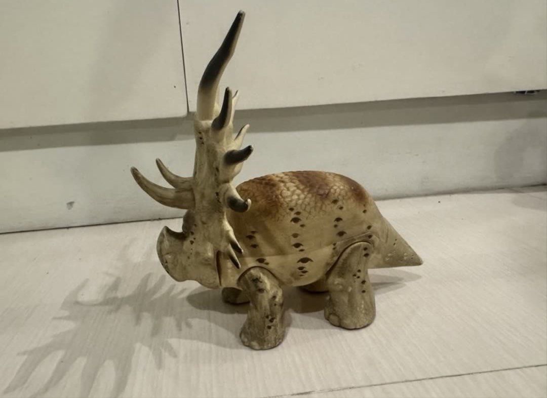 The Good Dinosaur Toy (Category: Figurines & Statues) located in Malolos. Submitted by wright.ricky (Listing ID 1470414469, Image 2). Description: - Realistic Styracosaurus dinosaur figurine with detailed textured skin - Features intricate horns along the frill and back with dark tips - Earthy brown and beige color scheme with a detailed facial expression - Sturdy plastic build standing firmly on four thick legs - Ideal as a toy for kids or a coo