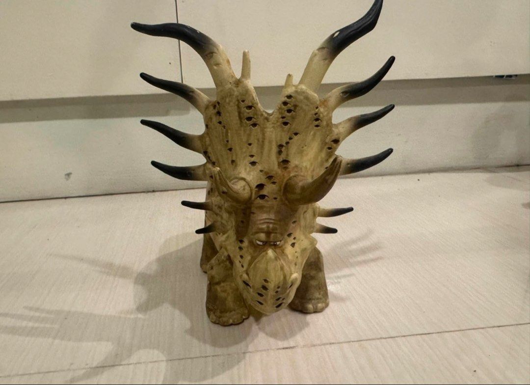 The Good Dinosaur Toy (Category: Figurines & Statues) located in Malolos. Submitted by wright.ricky (Listing ID 1470414469, Image 1). Description: - Realistic Styracosaurus dinosaur figurine with detailed textured skin - Features intricate horns along the frill and back with dark tips - Earthy brown and beige color scheme with a detailed facial expression - Sturdy plastic build standing firmly on four thick legs - Ideal as a toy for kids or a coo