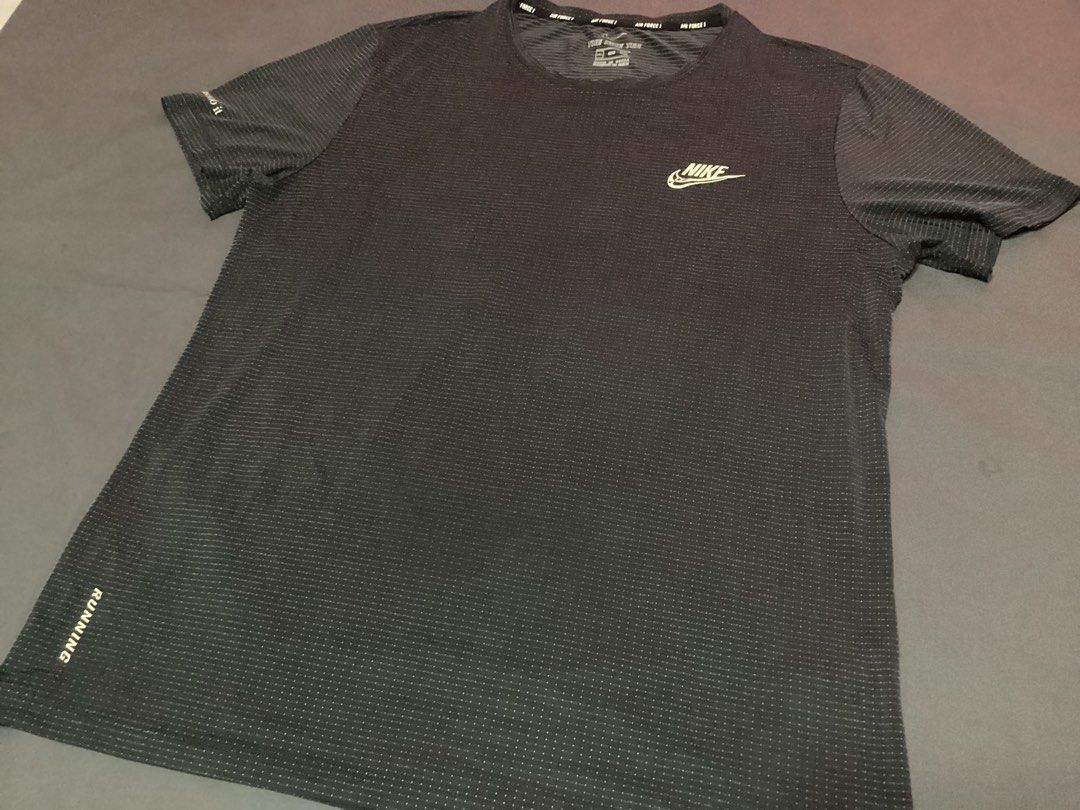 The Nike Tee (Category: Tshirts & Polo Shirts ) located in Davao. Submitted by ferdipt (Listing ID 1470374466, Image 1). Description: 2XL Made in China L:28 inches Armpit to Armpit:21 inches Running Shirt Excellent Condition .