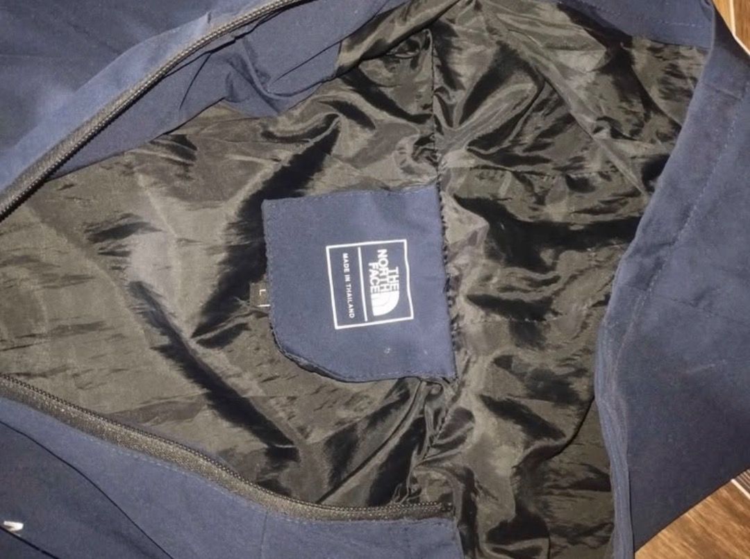 The North Face Navy Jacket (Category: Coats, Jackets and Outerwear) located in Caloocan City. Submitted by royal-phoenix (Listing ID 1470426766, Image 2). Description: Condition: Used but still in good condition Color: Navy blue Size: Large (L) on the tag Fit: Fits smaller than expected Full zipper with hood With front pockets Minimal signs of use Good for casual wear and outdoor activities (hiking).