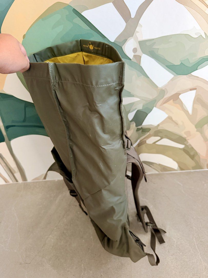 The North Face Weather Resistor Olive Green Backpack (Category: Backpacks) located in General Trias. Submitted by savers_keepers (Listing ID 1470350508, Image 3). Description: - Brand: The North Face - Color: Olive green with vibrant bright yellow interior lining - Style: Trendy roll-top design with large front pocket and buckle strap closure - Comfort & Support: Breathable mesh back panel, padded shoulder straps, and adjustable buckles - Special