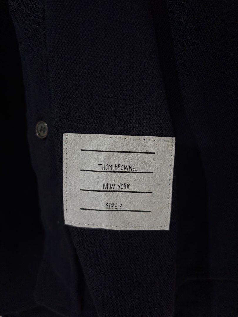 Thom Browne (Category: Activewear) located in Taguig. Submitted by andalisnestor (Listing ID 1470471655, Image 2). Description: Thom Browne Size 2 21x31 by inches (WxL) In pristine condition 6,500php only.