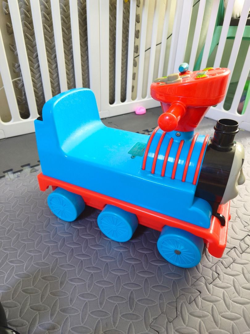 Thomas and Friends Ride-On Train Toy (Category: Kids Toys) located in Caloocan City. Submitted by lato042125 (Listing ID 1470402173, Image 2). Description: - Iconic Thomas the Train design with a friendly smiling face in bright blue and red - Easy-grip red steering handlebar for safe and simple control - Comfortable blue molded seat designed for toddlers - Sturdy plastic construction built to last - Smooth-rolling wheels ideal for both indoor and