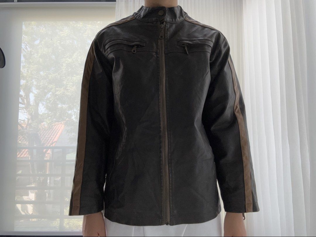 thrifted black & brown leather racer jacket (Category: Coats, Jackets and Outerwear) located in Manila. Submitted by gothclaudia (Listing ID 1470390011, Image 1). Description: RFS: decluttering my closet! :) not my style anymore - originally thrifted from Singapore last May 2025, hasn't been worn since! - heavy duty leather jacket - dark brown or black with beige and tan contrast racing stripes - front zip closure, two zipped chest pockets, and s