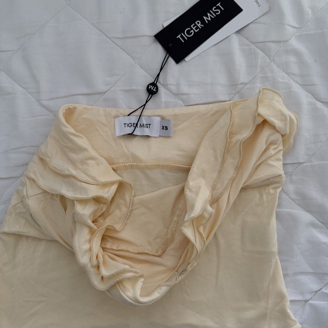Tiger Mist Denali Boob Tube (Category: Sleeveless) located in Davao. Submitted by aug_amari (Listing ID 1470354019, Image 2). Description: size XS-S stretchable :).