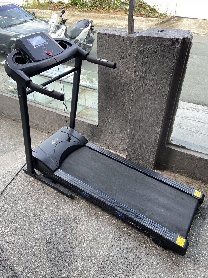 Time Sports DC55 Motorized Treadmill (Category: Cardio & Fitness Machines) located in Paranaque City. Submitted by cheskadejon (Listing ID 1470357229, Image 2). Description: Time Sports DC55 Treadmill for sale - Digital display tracks calories, time, pulse, distance, and speed - Convenient speed controls located on both the console and handles - Dual flex cushioning system along the deck for joint-friendly running - Built-in cup holders on both s