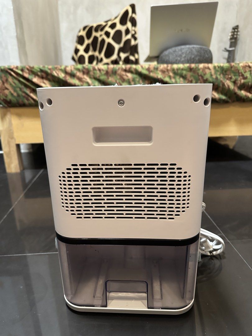 Tixx Electric Dehumidifier (Category: Air Purifiers & Dehumidifiers) located in Valenzuela. Submitted by nicadahhh (Listing ID 1470516590, Image 2). Description: Selling my TIXX Dehumidifier 2.5L - 2 in 1 ( dehumidifer & purifier) - 2.5L water tank capacity - helps reduce excess moisture and dampness - compact and space-saving design - no issues DM if interested!.